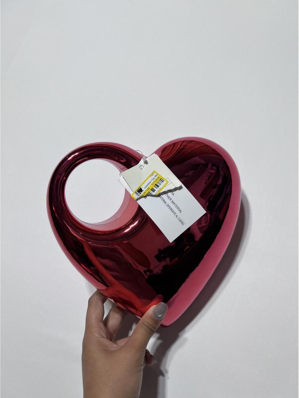Red Metallic Heart-Shaped Decorative Object with Handle